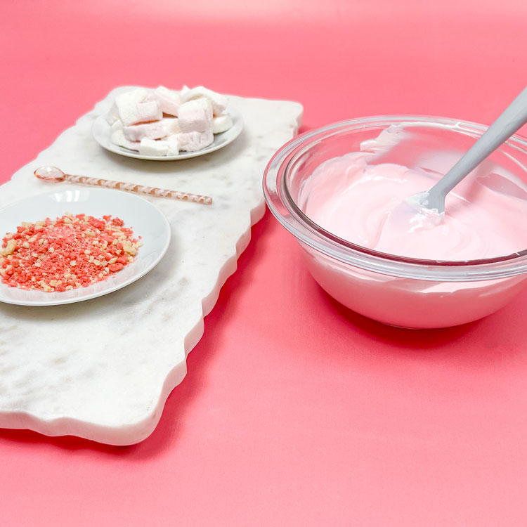 pink melted chocolate in a bowl