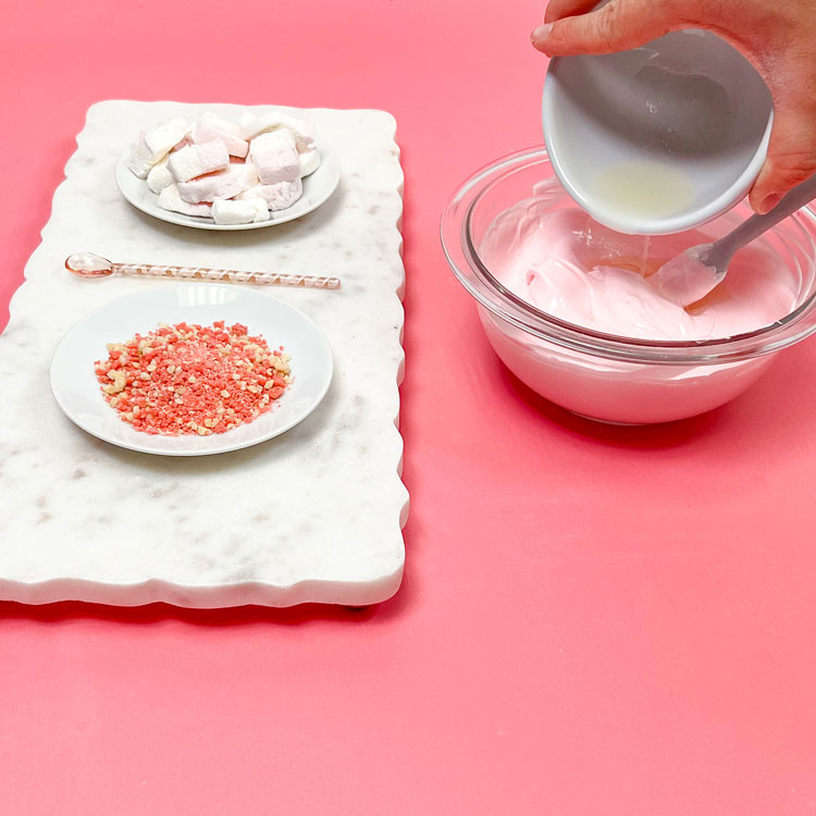 adding melted paramount crystals to thickened melted chocolate to thin