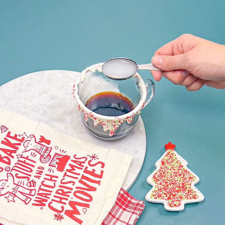 adding sugar cookie syrup to espresso