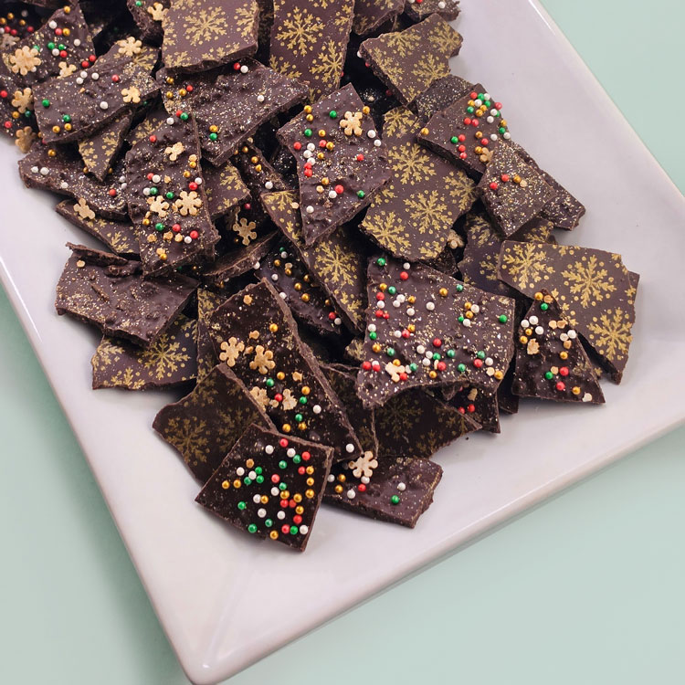 plate of thin mint chocolate bark decorated for christmas
