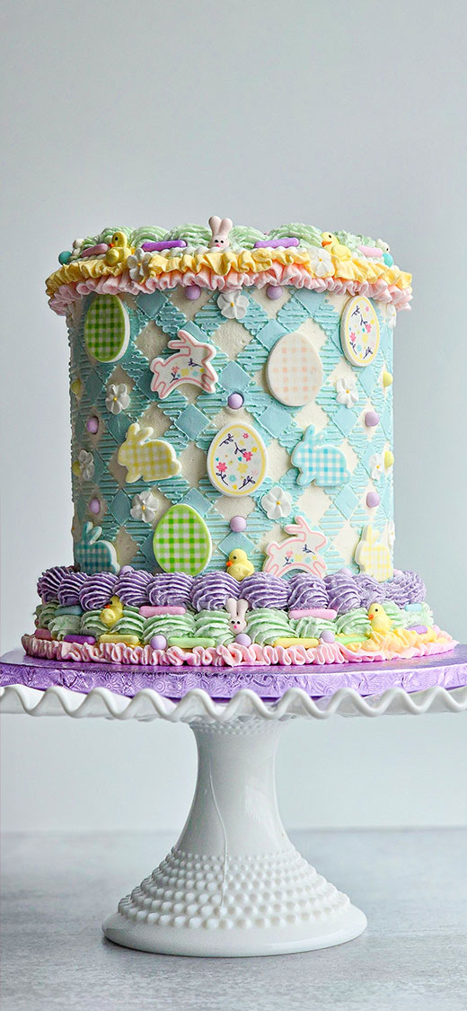 vintage piped easter cake on a cake stand