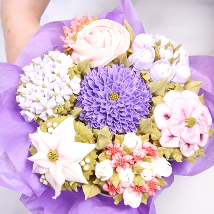 arranging paper cups for a cupcake bouquet