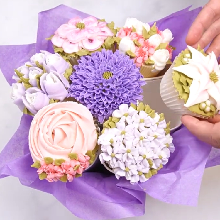 arranging paper cups for a cupcake bouquet