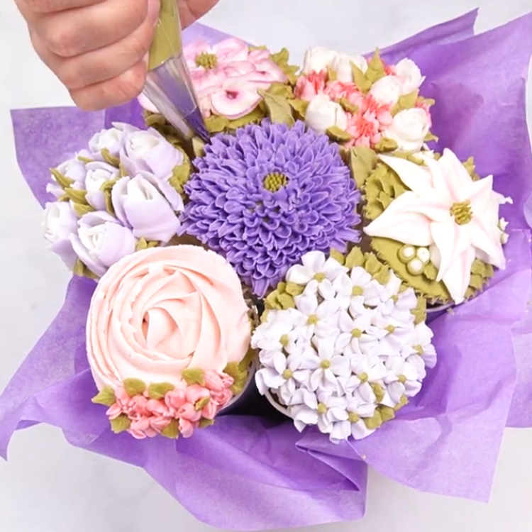 arranging paper cups for a cupcake bouquet